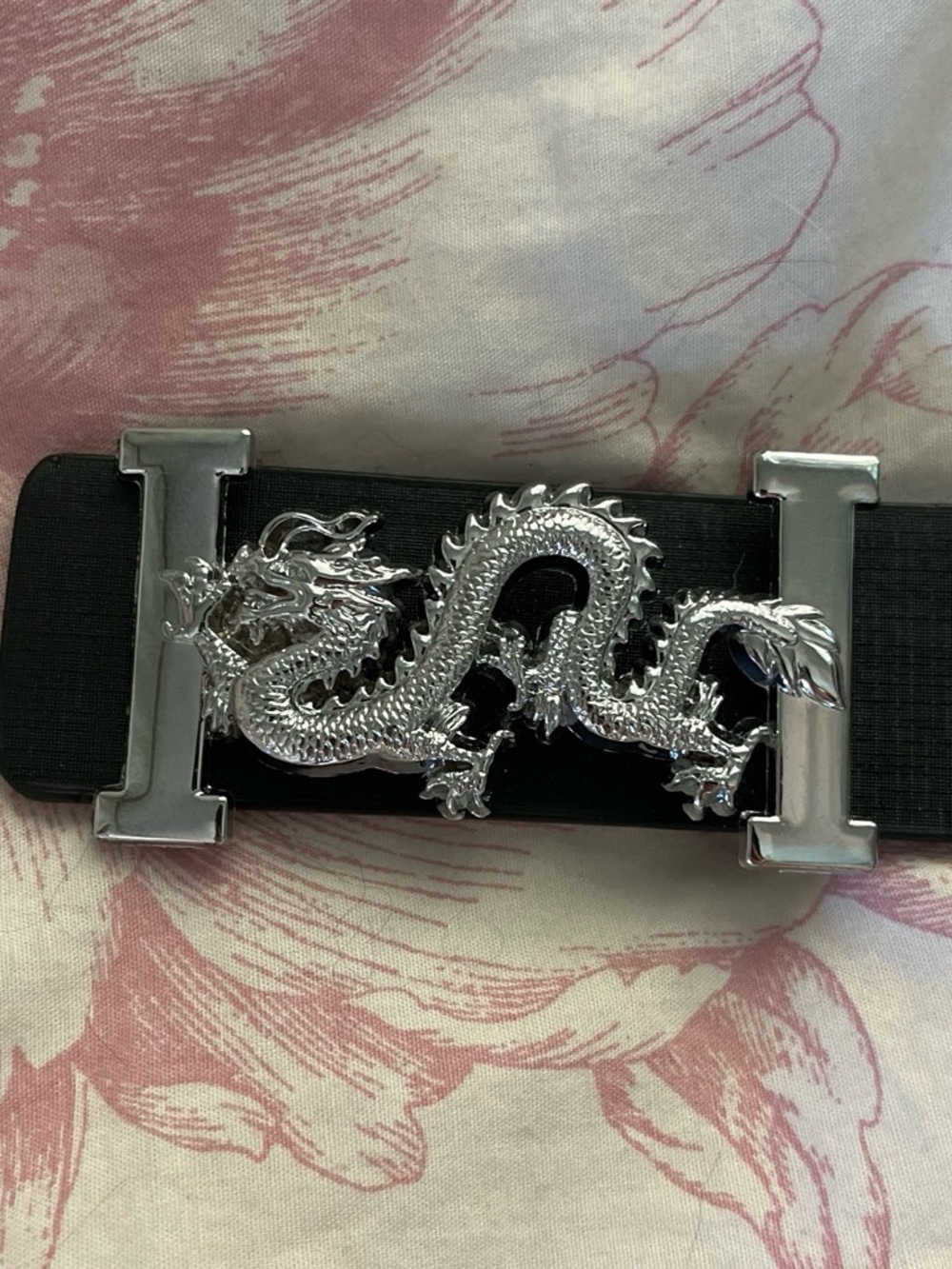 Black faux leather belt with silver dragon buckle